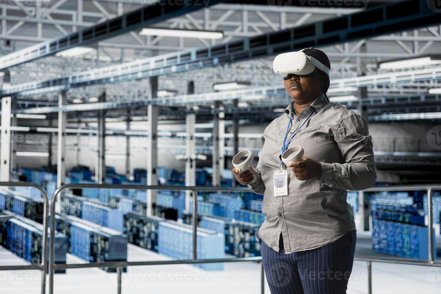 Server room worker using VR gear to improve gear performance, upgrading rigs. Data center engineer using virtual reality technology to analyze datasets, managing infrastructure systems photo