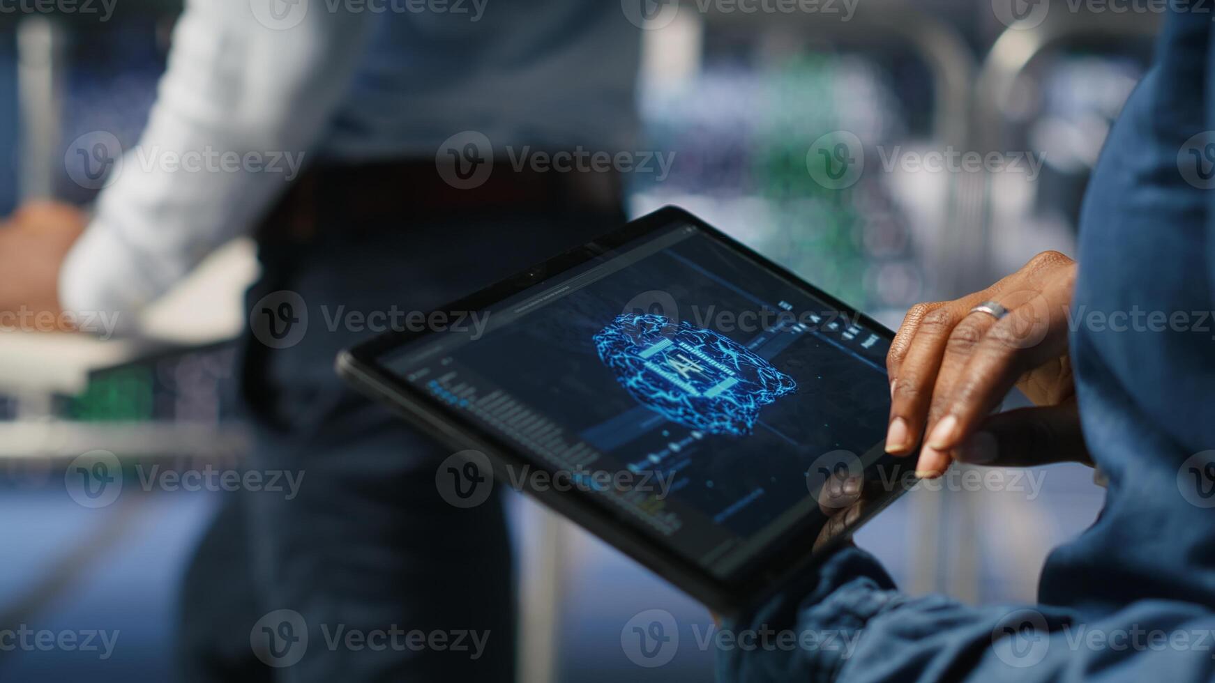 Close up of data center engineer using tablet, doing maintenance on rigs handling AI processing tasks. Server hub computer scientist managing storage arrays supporting deep learning tech photo
