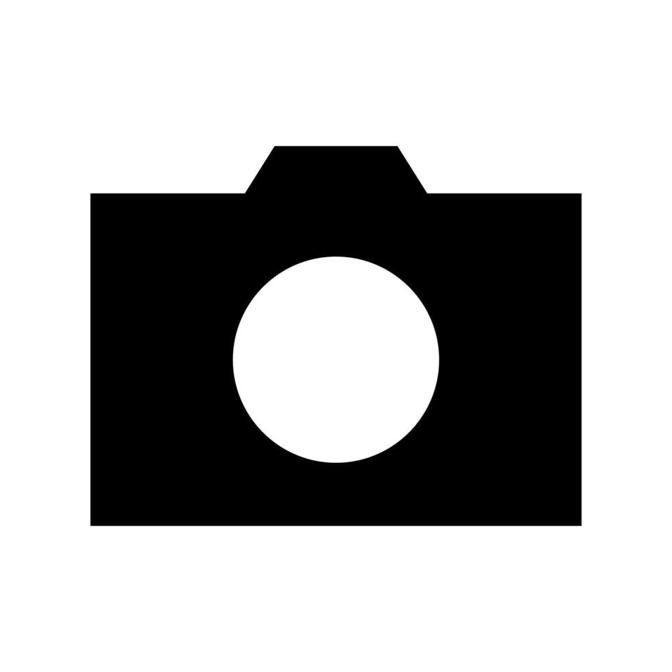 A simple filled icon of a digital photo camera device. vector