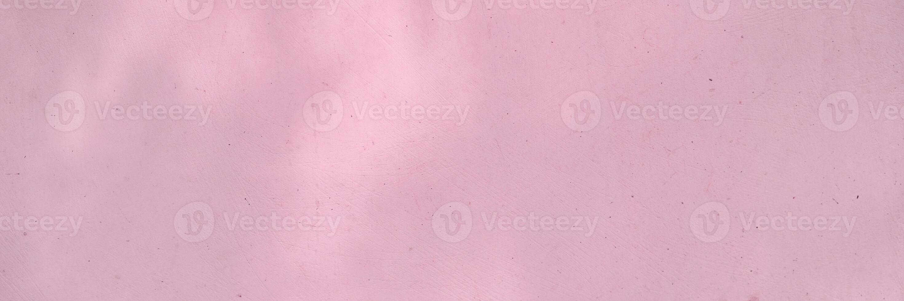 Minimalistic light pink textured background with subtle patterns for creative design projects. photo