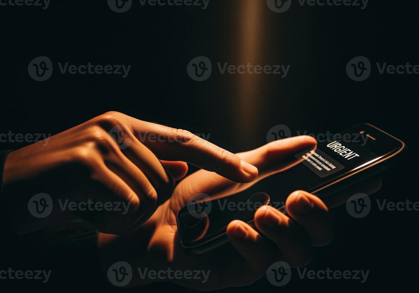 Hands holding smartphone displaying urgent message notification in dark light photo