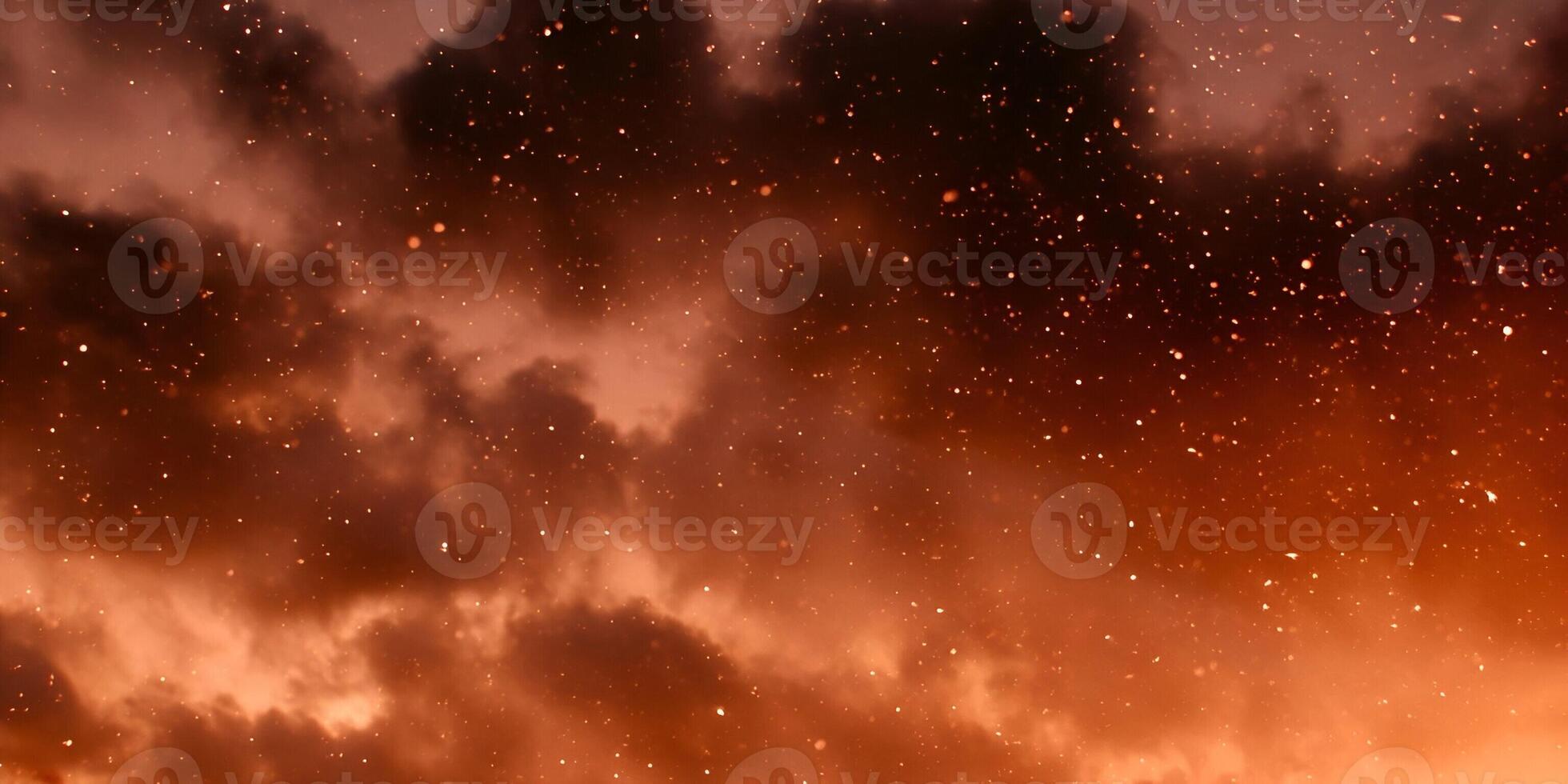 A dramatic fiery sky with glowing orange and red clouds features many sparkling particles creating an intense abstract background photo