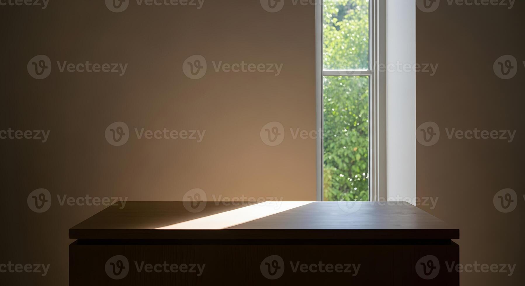 Sunlight streaming onto a minimalist wooden table by a window, highlighting the serene and peaceful atmosphere of an empty room, ideal for quiet contemplation or product display photo