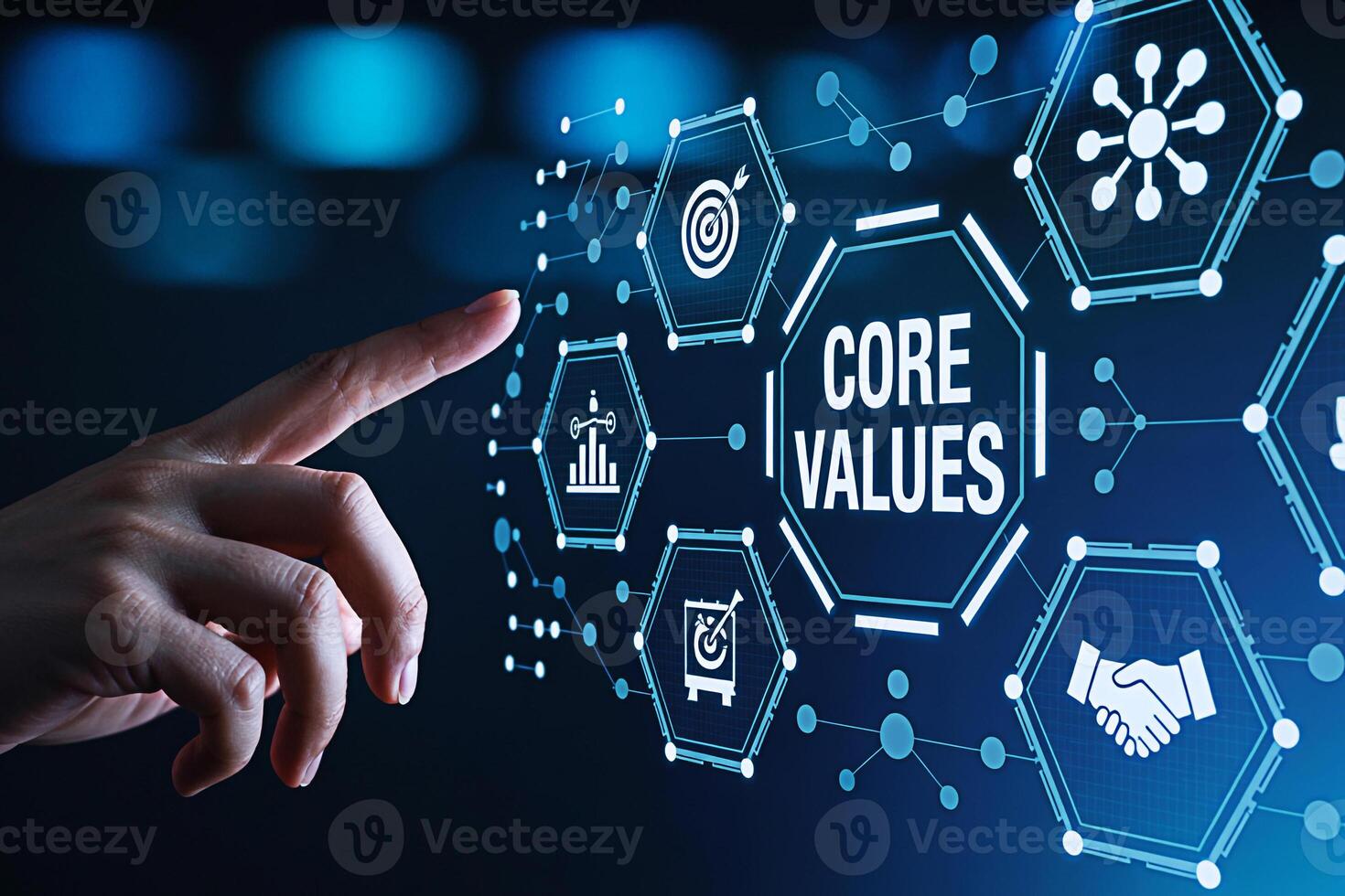 Finger touching a digital screen displaying core values and business ethics icons in a modern technology environment representing integrity teamwork and corporate responsibility with a futuristic feel photo