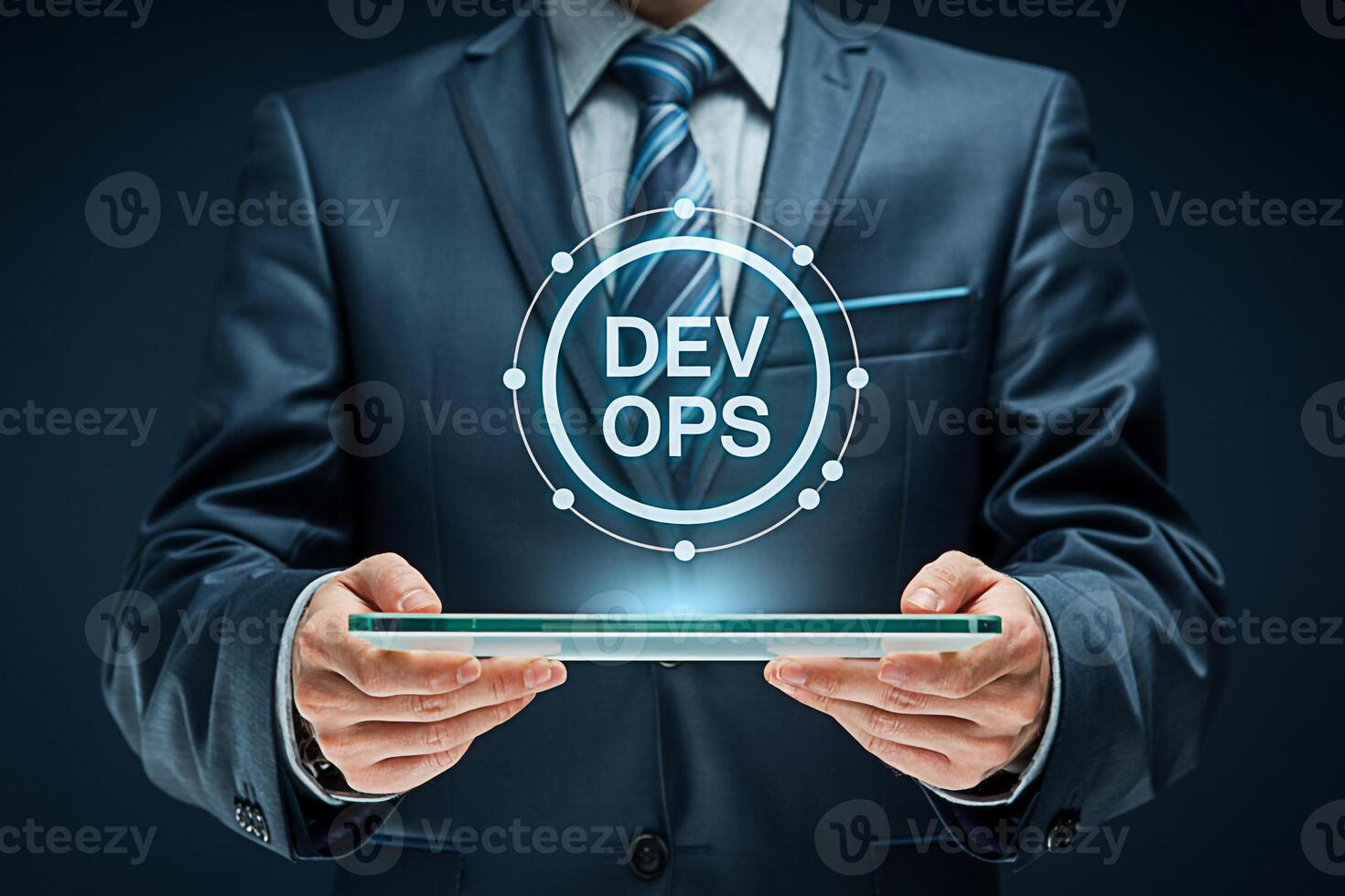 Professional businessman in a suit presenting a DevOps concept on a transparent tablet in a corporate setting symbolizing innovation efficiency and modern technology for software development and IT op photo