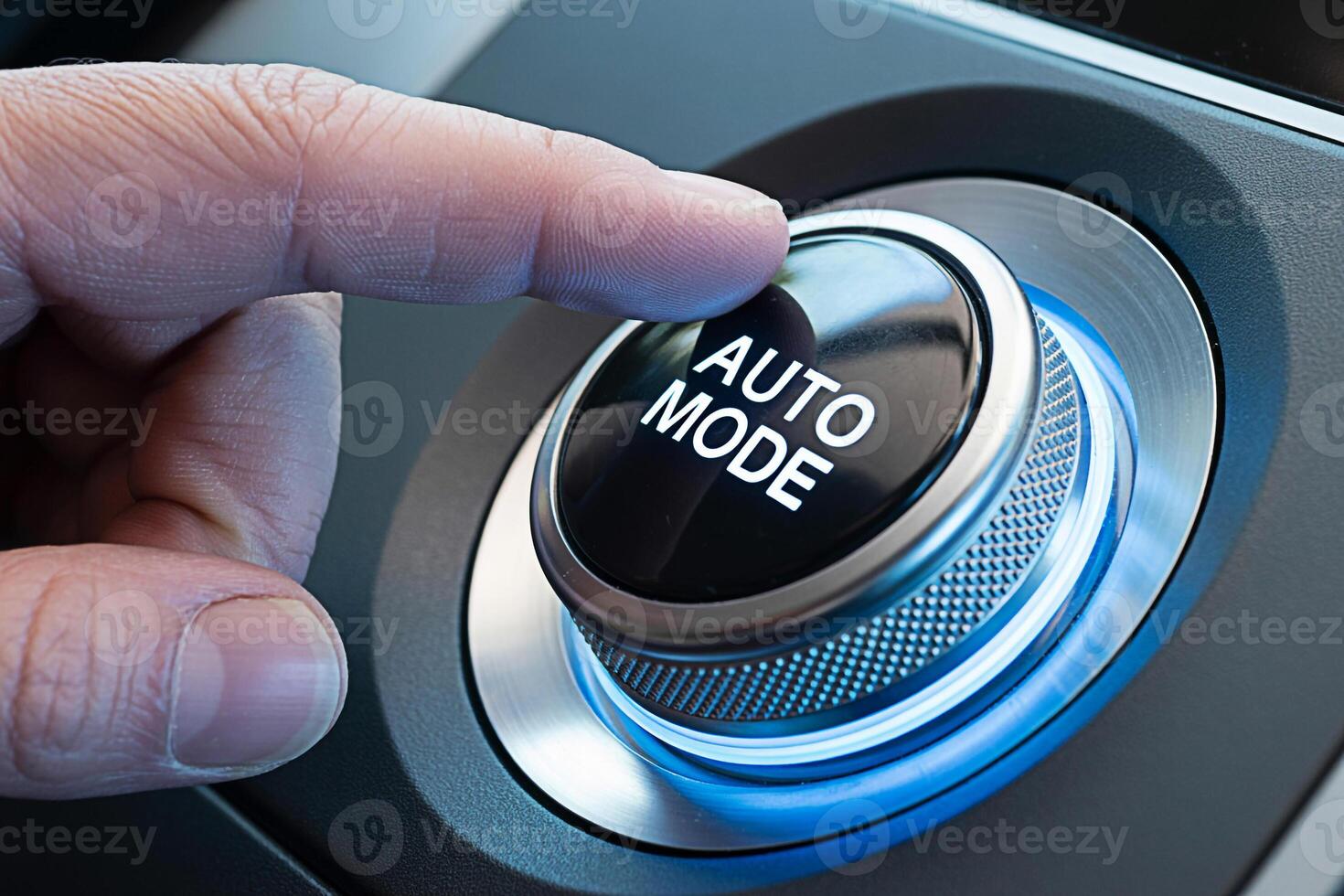 Close-up of a finger pressing the Auto Mode button on a modern cars dashboard showcasing convenience and technological advancement in a sleek illuminated setting emphasizing ease of use and automated photo