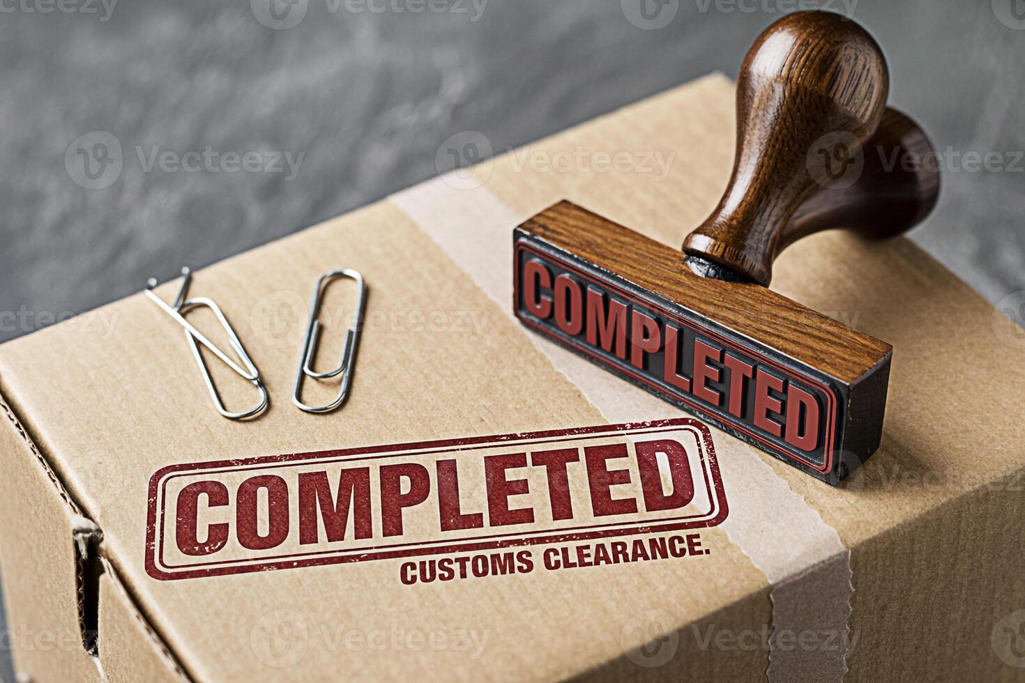 Close-up of a cardboard box with a Completed stamp signifying successful customs clearance in a logistics setting conveying efficiency and the final stage of the shipping process photo