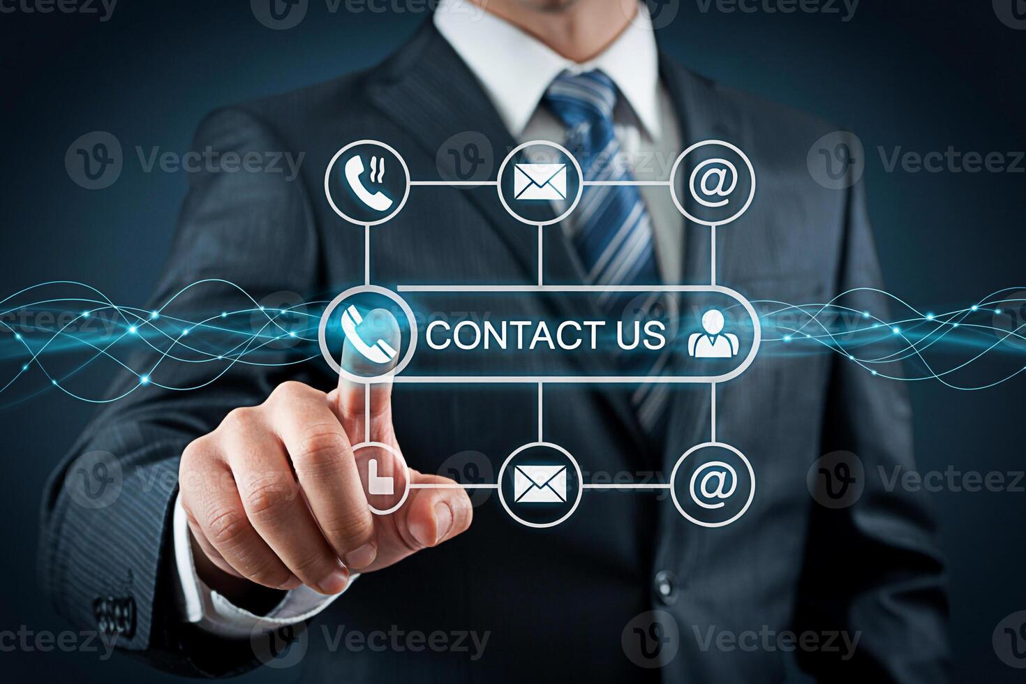 Professional businessman in a suit touching a digital Contact Us interface with icons for phone email and user support symbolizing customer service and online communication in a modern business settin photo