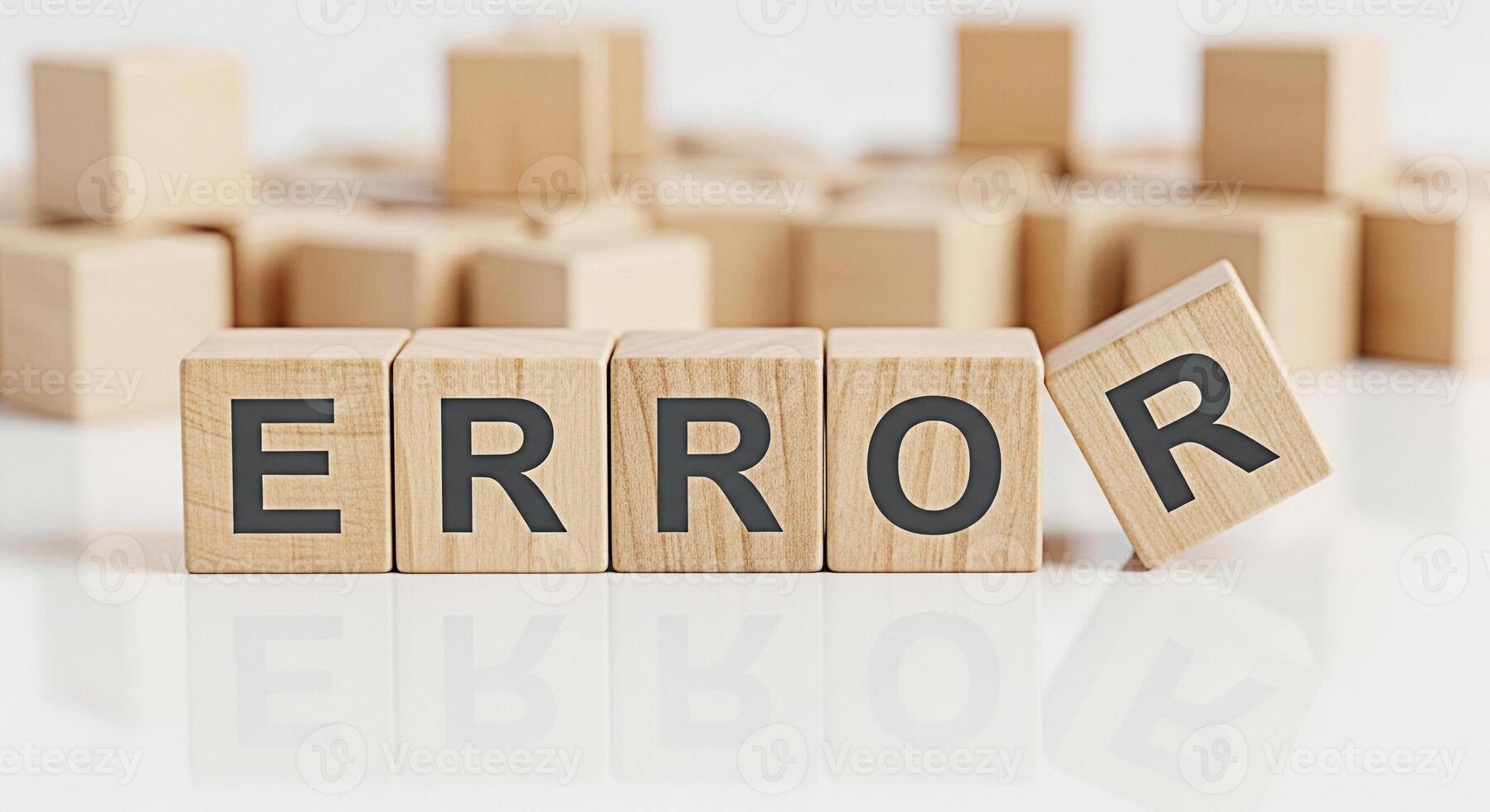 Wooden blocks spelling ERROR on a white surface symbolizing a mistake or failure highlighting the importance of problemsolving and quality control in business and technology conveying a sense of urgen photo