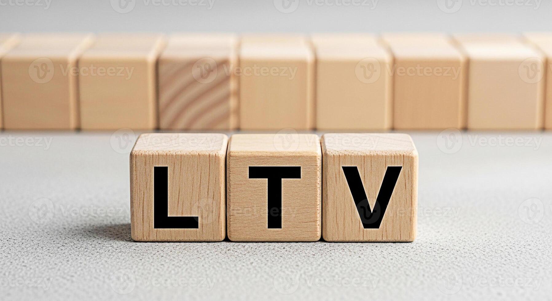 Wooden blocks displaying LTV on a textured surface representing customer lifetime value in a business context symbolizing longterm financial planning and strategic investment for sustainable growth an photo
