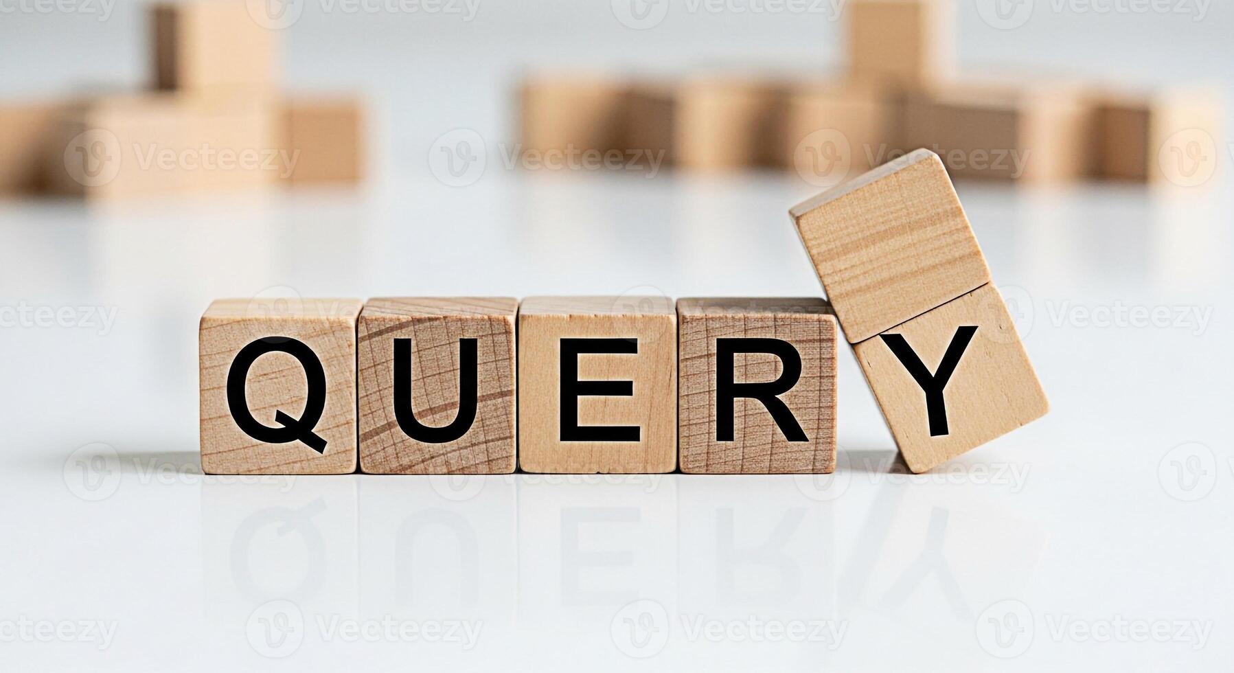 Wooden blocks spelling QUERY on a white surface with a focus on information retrieval and search engine optimization creating a clean and minimalist aesthetic for business and technology concepts photo