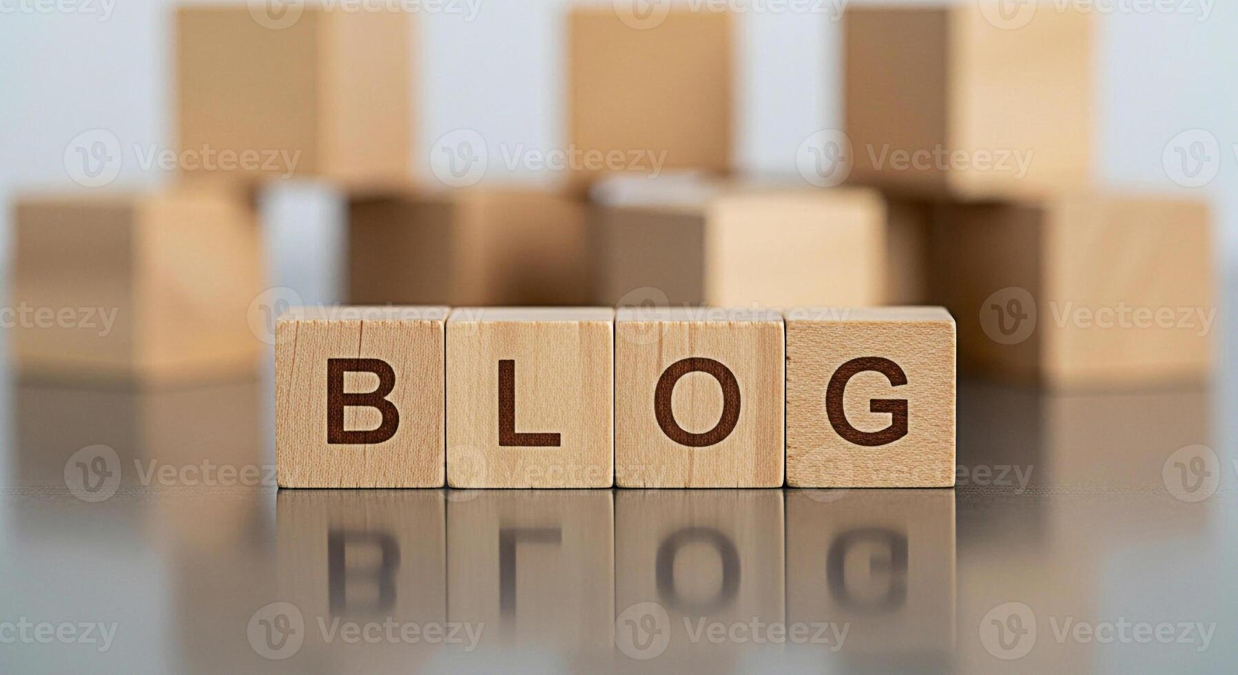 Wooden blocks spelling BLOG on a reflective surface symbolizing online content creation and digital communication in a modern minimalist setting conveying a sense of information and connection photo