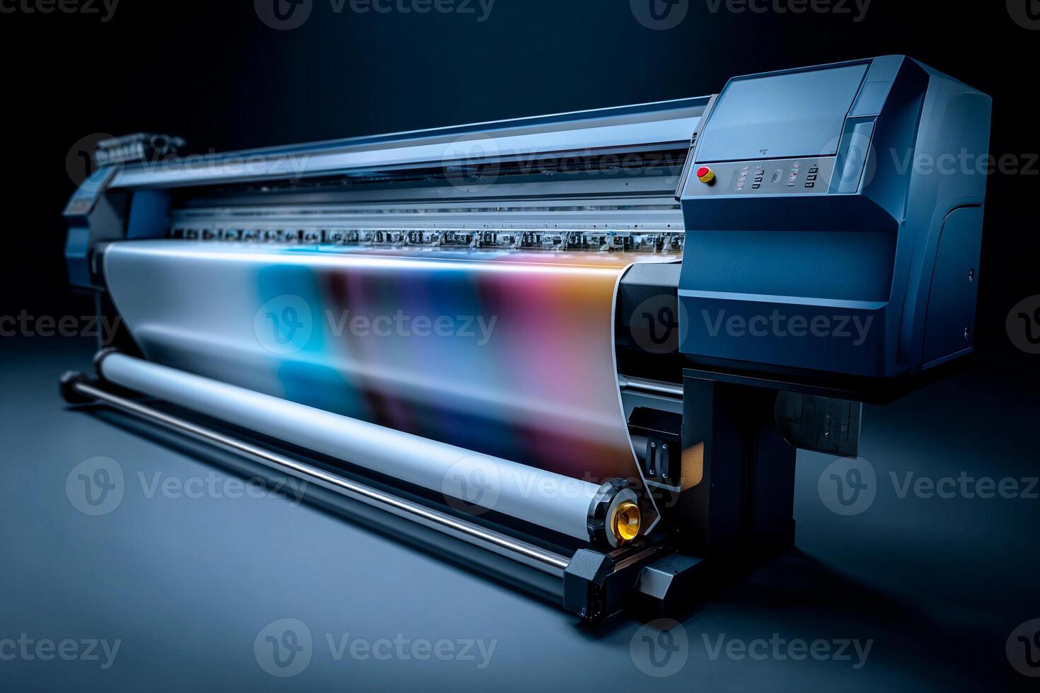A large format printer is actively printing colorful graphics in a professional studio environment. The scene highlights the printer's intricate design and the luminous colors being produced photo