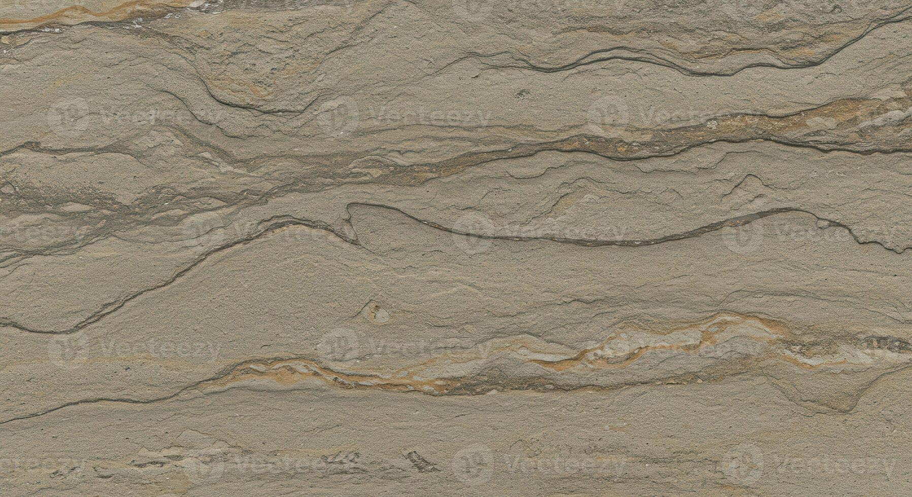 The smooth surface of the tan and brown colored sandstone tile exhibits a distinct wavy pattern adding depth and character to its texture. photo