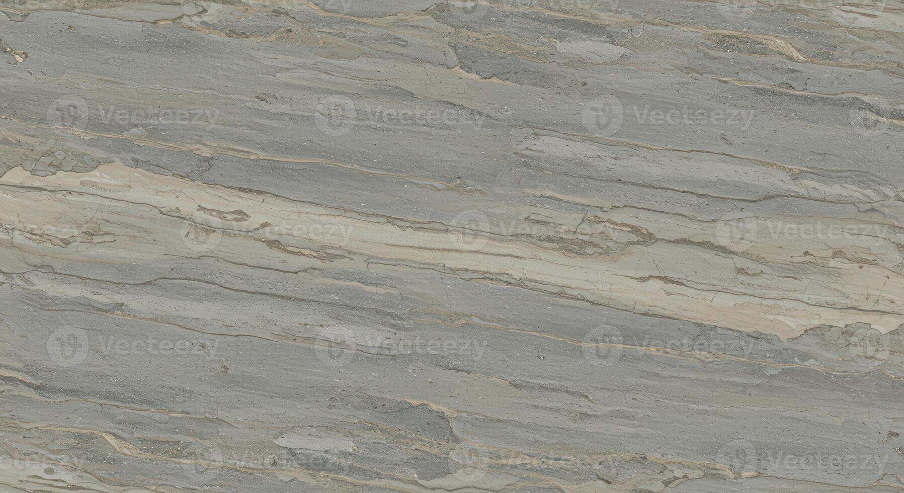 Close up shows a textured gray stone background with diagonal patterns and natural variations in color, creating a rustic and organic look. photo