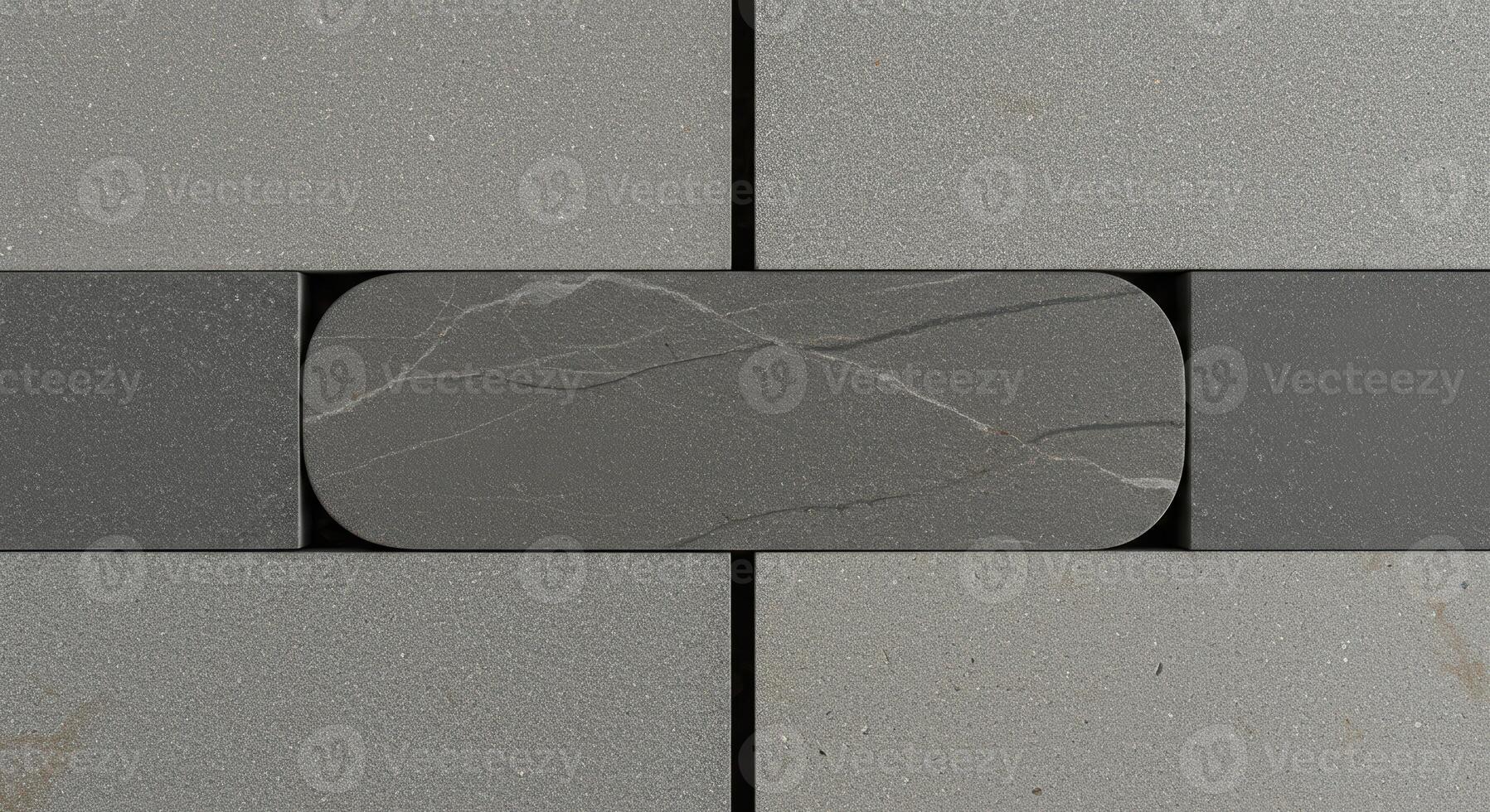 Elegant dark gray stone accent tile contrasts with textured light gray rectangular tiles in this sleek minimalist architectural design project. photo