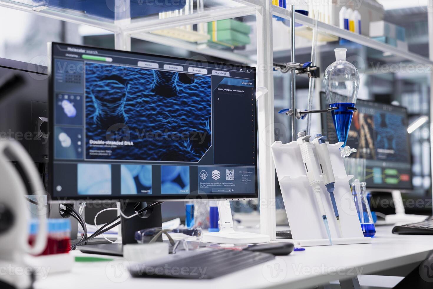 Computer monitor in biotechnology laboratory showing 3D molecular model visualization used for research. High tech bioengineering software on PC in medical lab displaying DNA data photo
