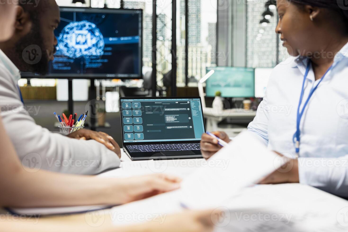 Recruiters team filtering through candidate applications and resumes with AI systems, applying smart automation and machine learning for post interview decision making. Business innovation. photo