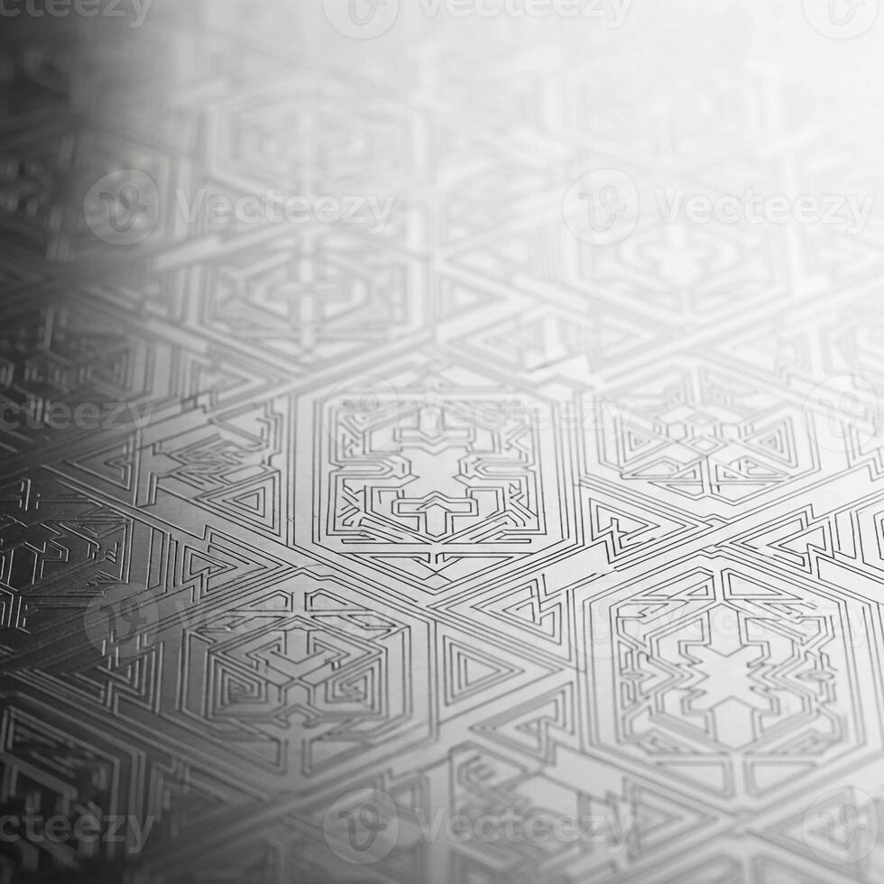 Intricate geometric pattern with floral motifs embossed on a metallic surface with subtle gradient lighting photo