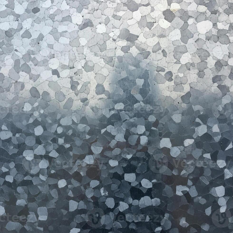 Abstract mosaic of shimmering silver and blue grey geometric shapes creating a textured gradient effect photo