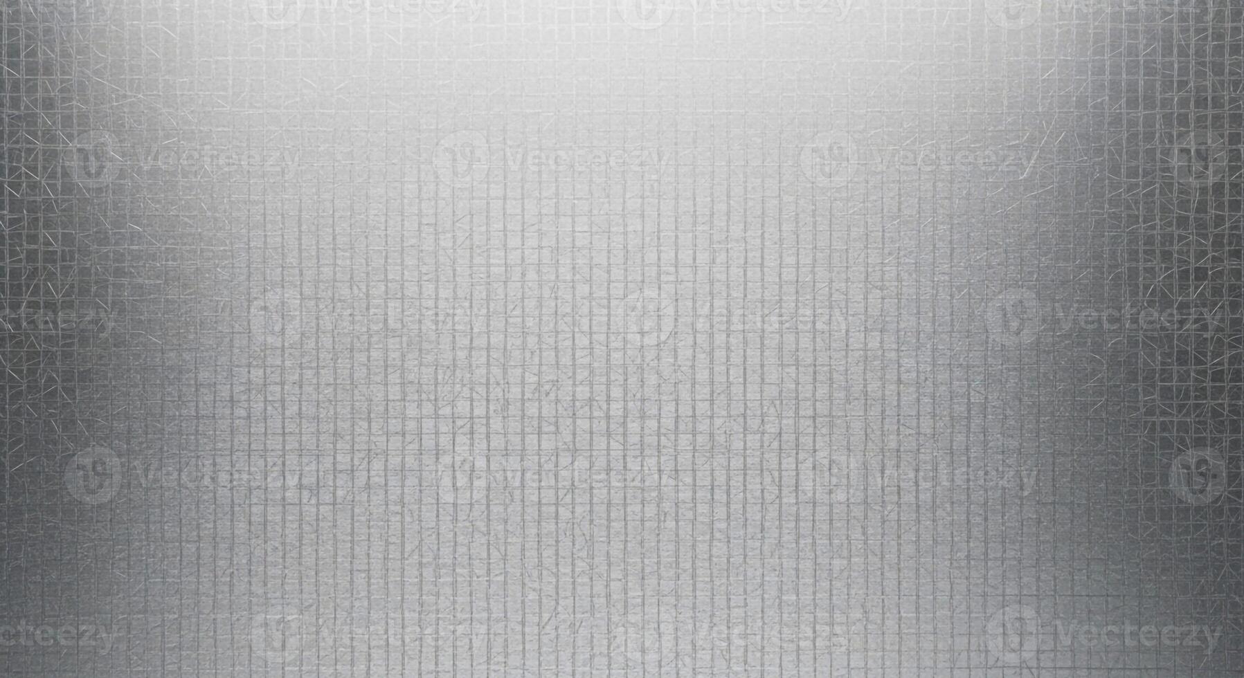 Subtle brushed metal texture with a soft gradient of light and shadow creating a modern industrial background photo