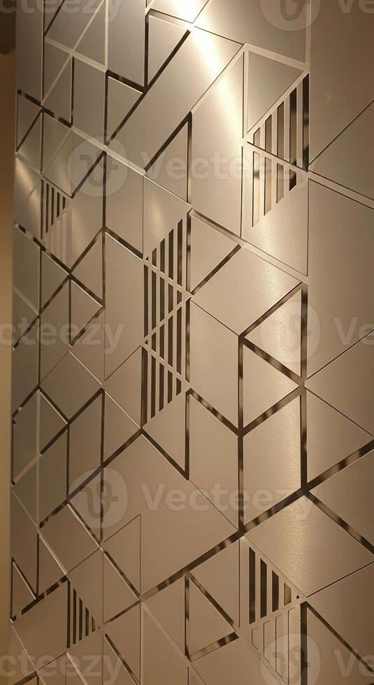 Geometric frosted glass panel with interlocking cubic patterns and subtle vertical lines creating a modern abstract design photo