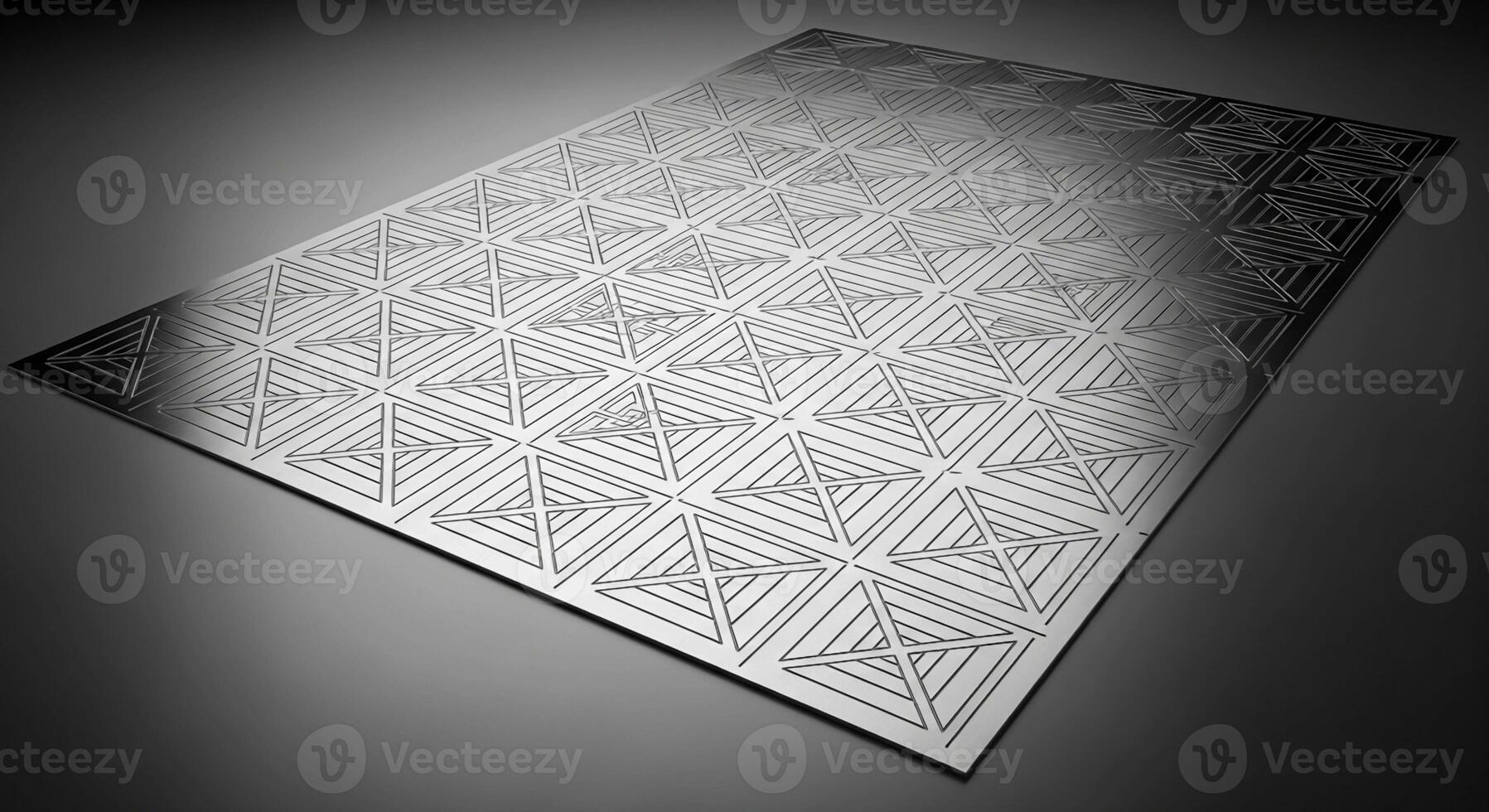 Intricate geometric pattern on a textured surface with dramatic lighting and shadow play photo