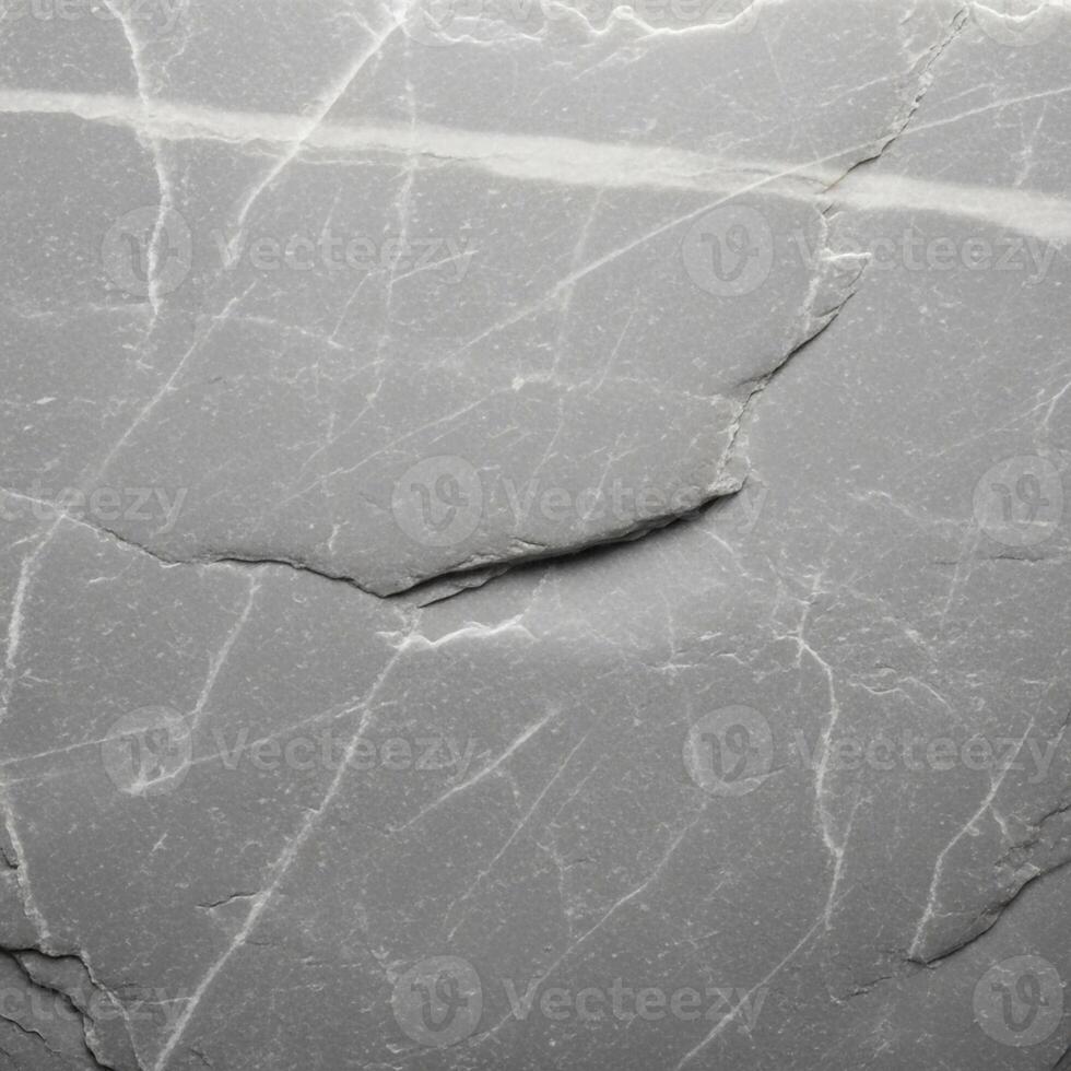 Close up macro view of a fractured gray stone surface revealing intricate natural patterns and subtle textures photo