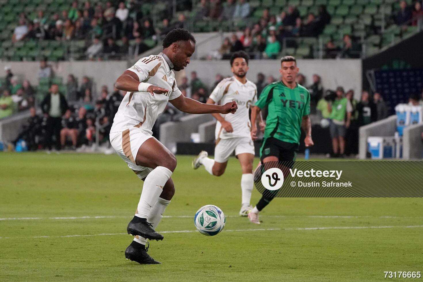 LAFC forward Jeremy Ebobisse (17) stops the ball to kick a goal during the second half against Austin FC at Q2 Stadium. editorial_image