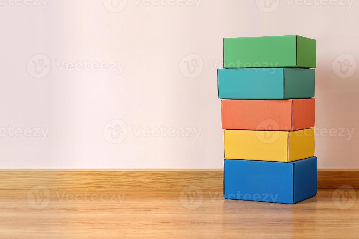 Stack of Colorful Boxes Indoors Against a Plain Wall on a Wooden Floor in Natural Light Creating a Minimalistic and Vibrant Composition photo