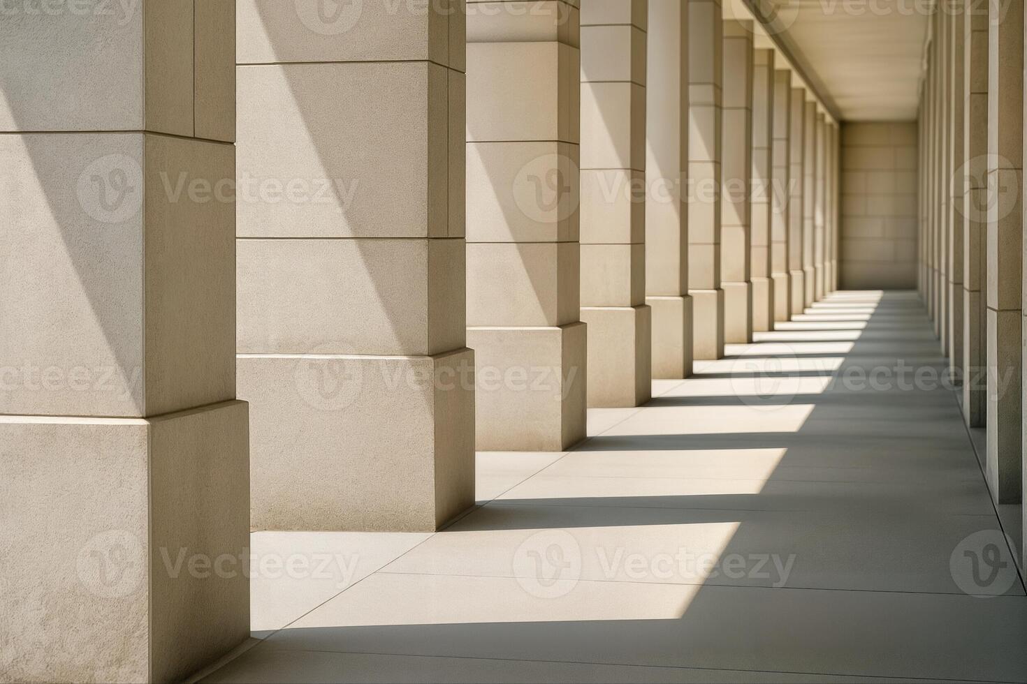 Colonnade Under Bright Sunlight Creating Geometric Patterns of Light and Shadow in an Architectural Setting With Strong Architectural Lines and Receding Perspective photo