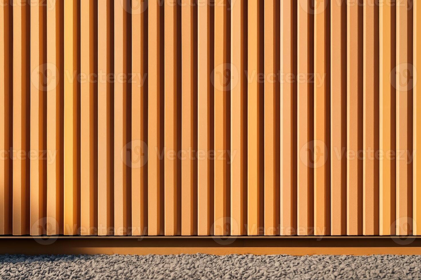 Terracotta Panels Catching Golden Sunset Light on Rippling Textured Surface in Outdoor Setting With Vertical Lines Creating a Modern Architectural Composition photo