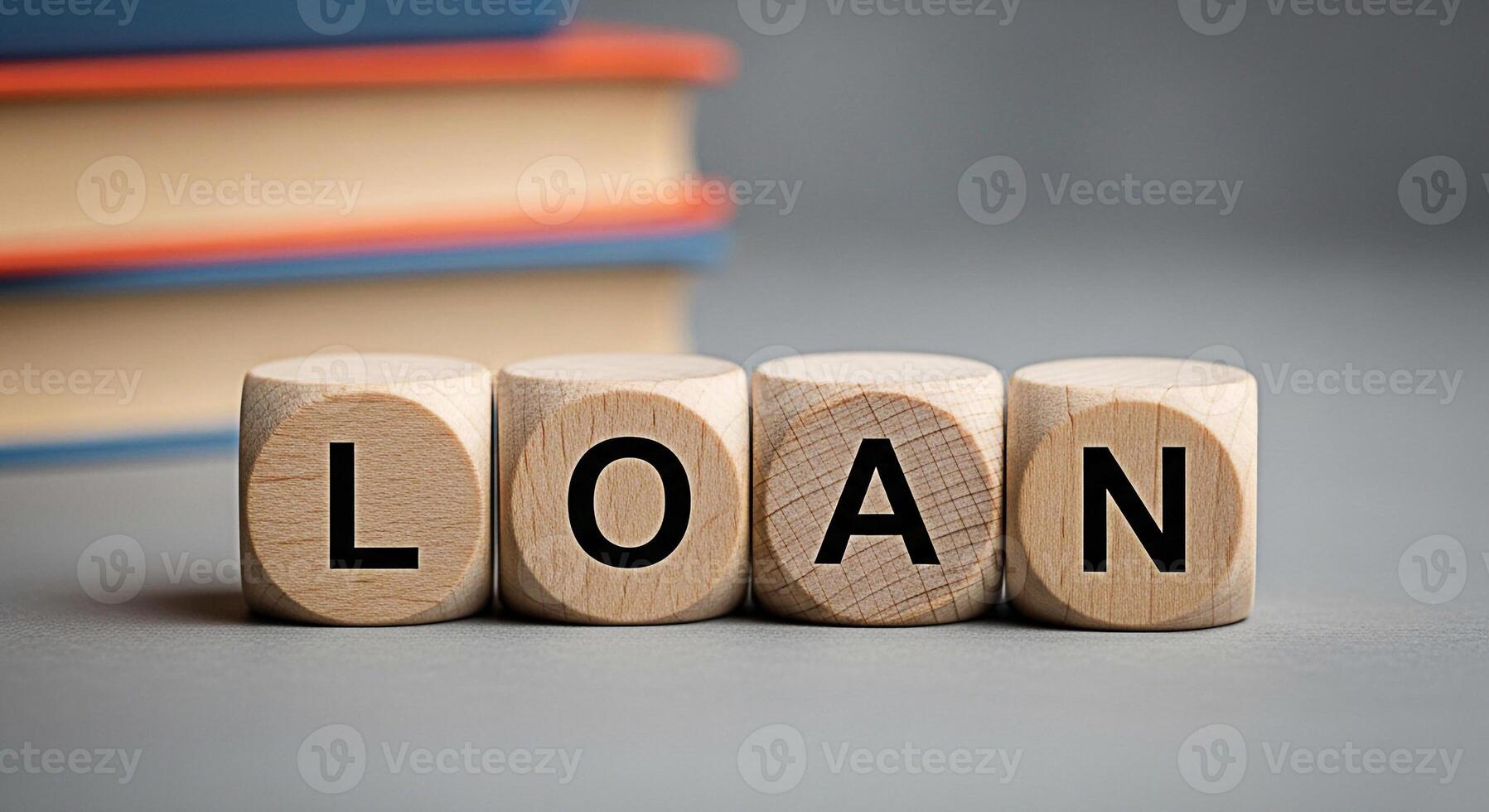 Stack of colorful hardcover books resting on a gray surface symbolizing knowledge education and the joy of reading in a simple minimalist setting perfect for backtoschool or library themes photo