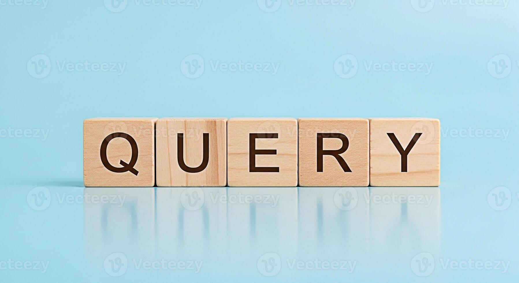 Wooden blocks spelling QUERY on a light blue surface representing information retrieval and search conveying a sense of curiosity and the pursuit of knowledge in a digital age photo