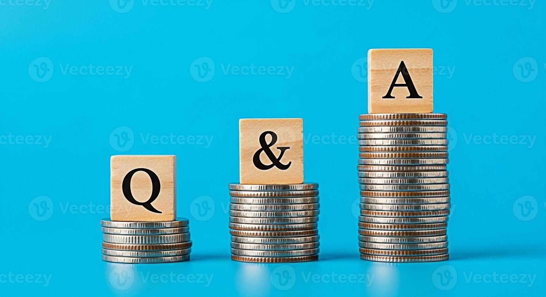 Wooden blocks displaying Q A sitting atop stacks of coins on a blue background representing questions answers and financial growth symbolizing knowledge investment and positive outcomes photo