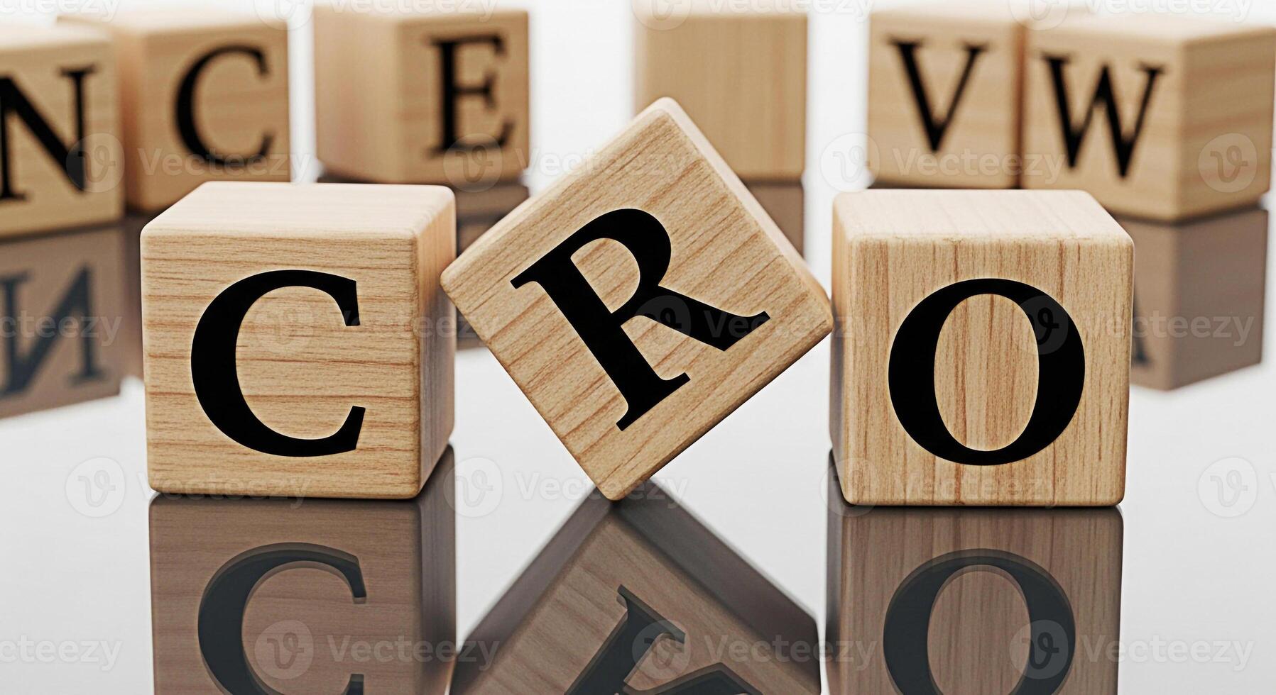 Wooden blocks spelling CRO on a reflective surface symbolizing conversion rate optimization with other blocks showing letters conveying a message of business growth and digital marketing strategy in a photo