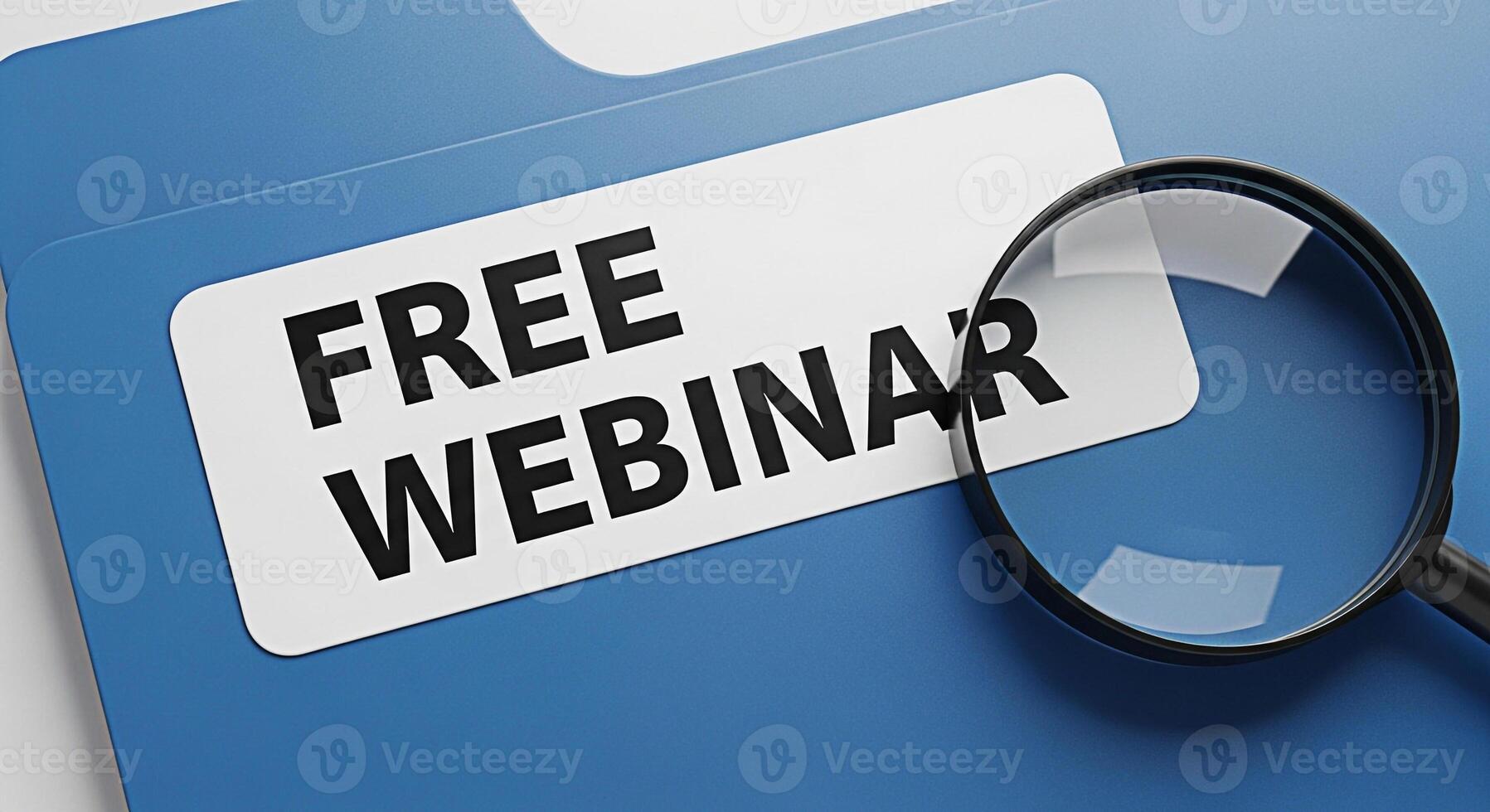Closeup of a blue file folder displaying Free Webinar under a magnifying glass symbolizing opportunity and education in a professional setting highlighting the concept of accessible online learning an photo