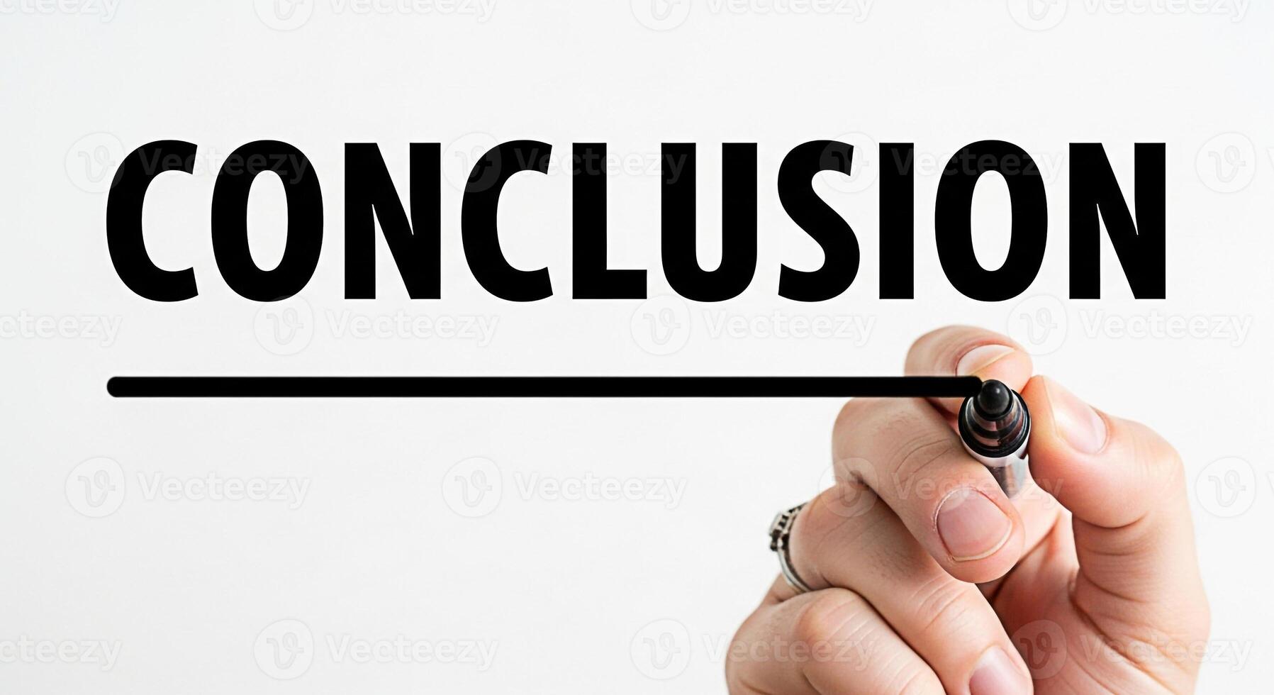 Closeup of a hand underlining the word Conclusion on a white background symbolizing the final stage of a project emphasizing completion resolution and the importance of reaching a conclusive outcome photo