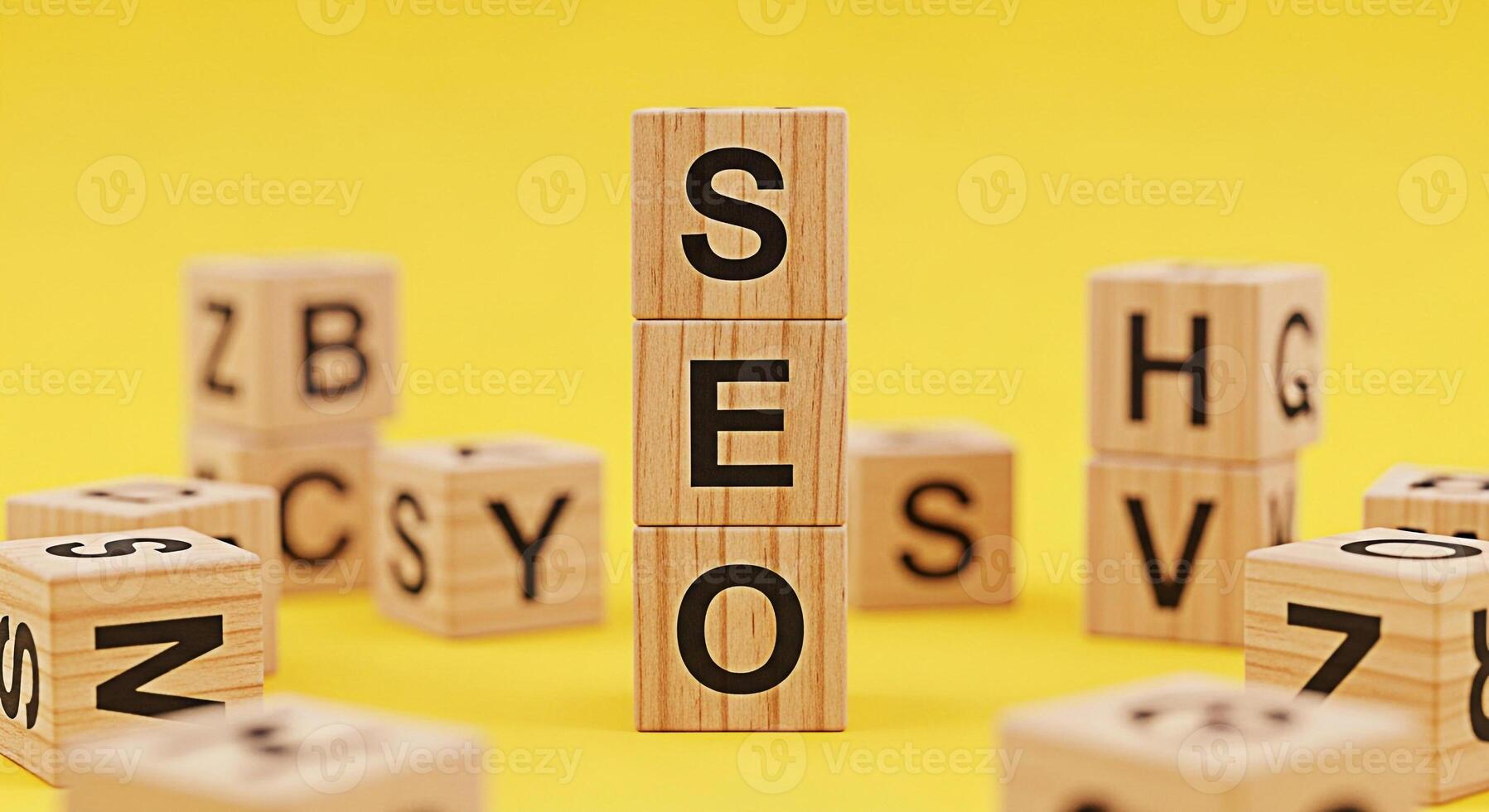 Wooden blocks spelling SEO standing tall amidst scattered alphabet blocks against a bright yellow background symbolizing optimization and the importance of search engine visibility for online success photo