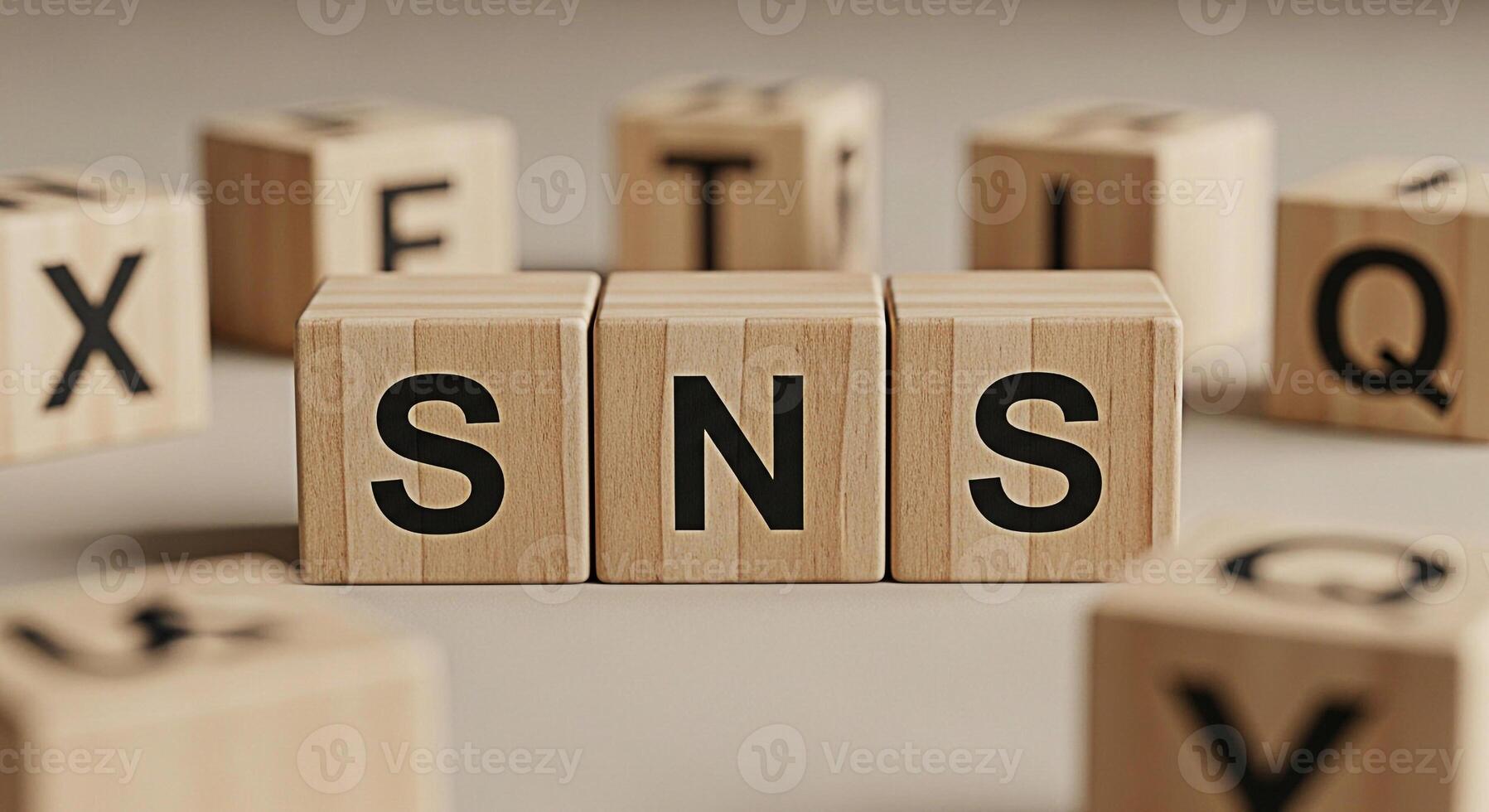 Wooden blocks spelling SNS on a neutral surface conveying a message about social networking and online communication emphasizing connection and information sharing in the digital age with a clean mini photo