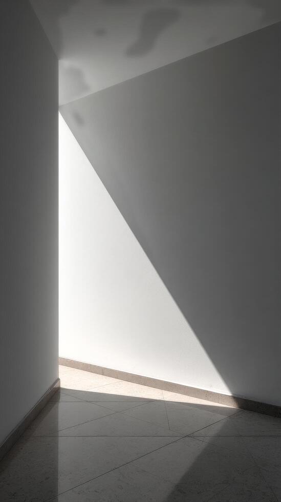 Light Creates a Geometric Triangle Shape on a Minimalistic Concrete Floor in an Empty Room photo
