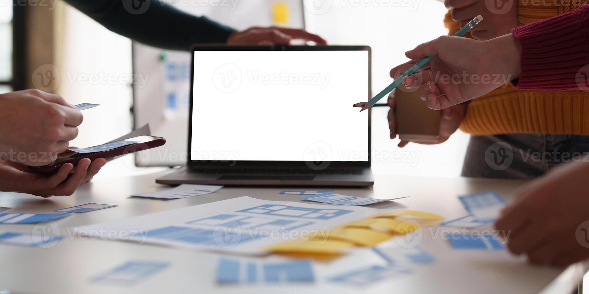 Group of ux developer and ui designer brainstorming about app interface design at modern office. Creative digital development agency photo