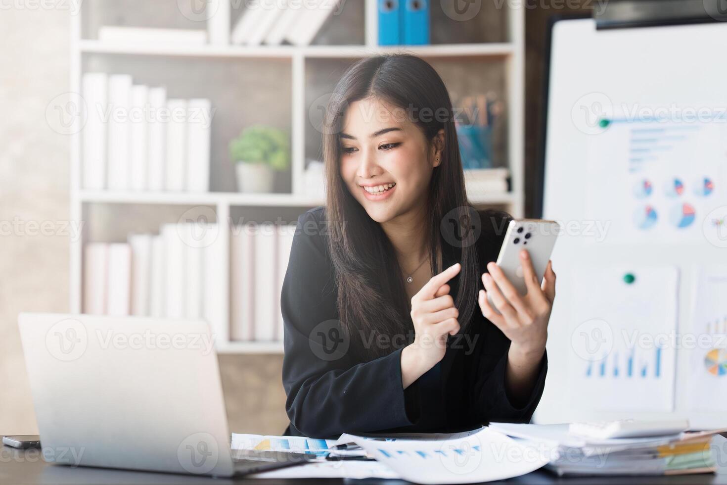 Beautiful Businesswoman completes KYC using an online banking program in order to open a digital savings account. The definition of cyber security photo