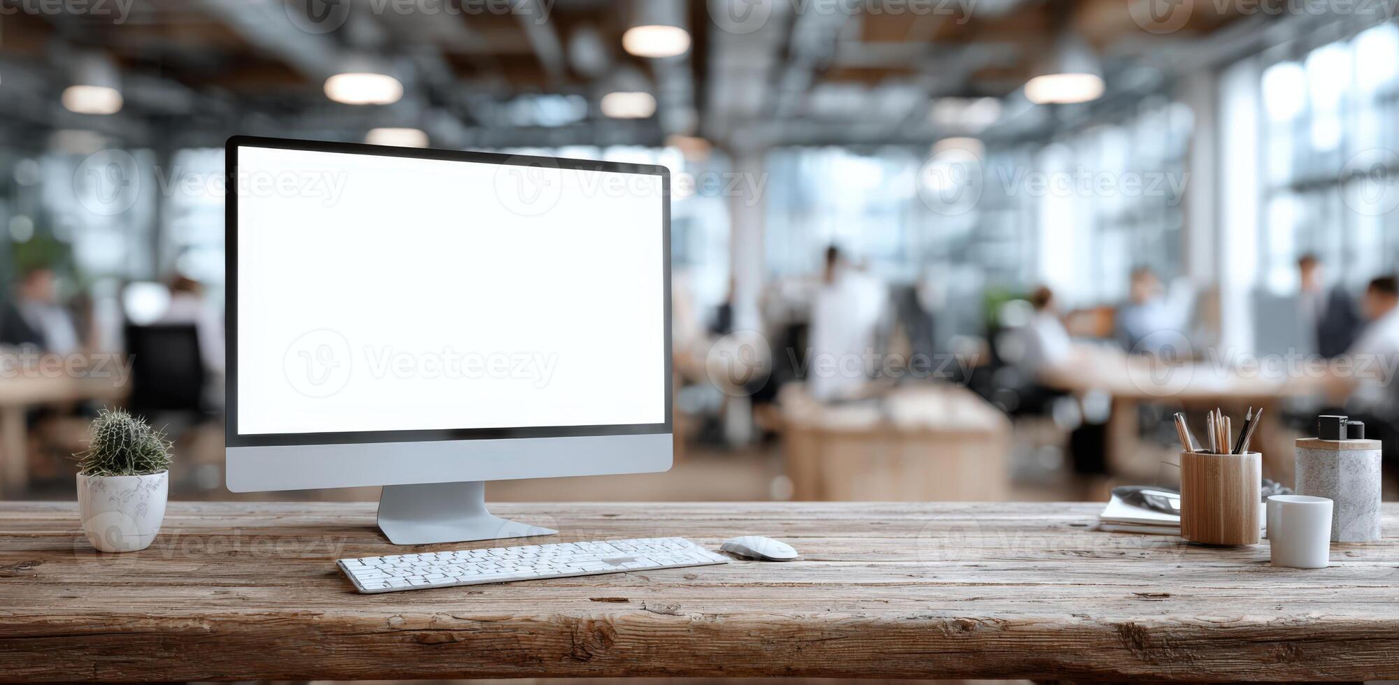Modern workspace featuring a sleek desktop computer with a blank screen, wooden desk, and office supplies, creating an ideal environment for productivity and creativity photo