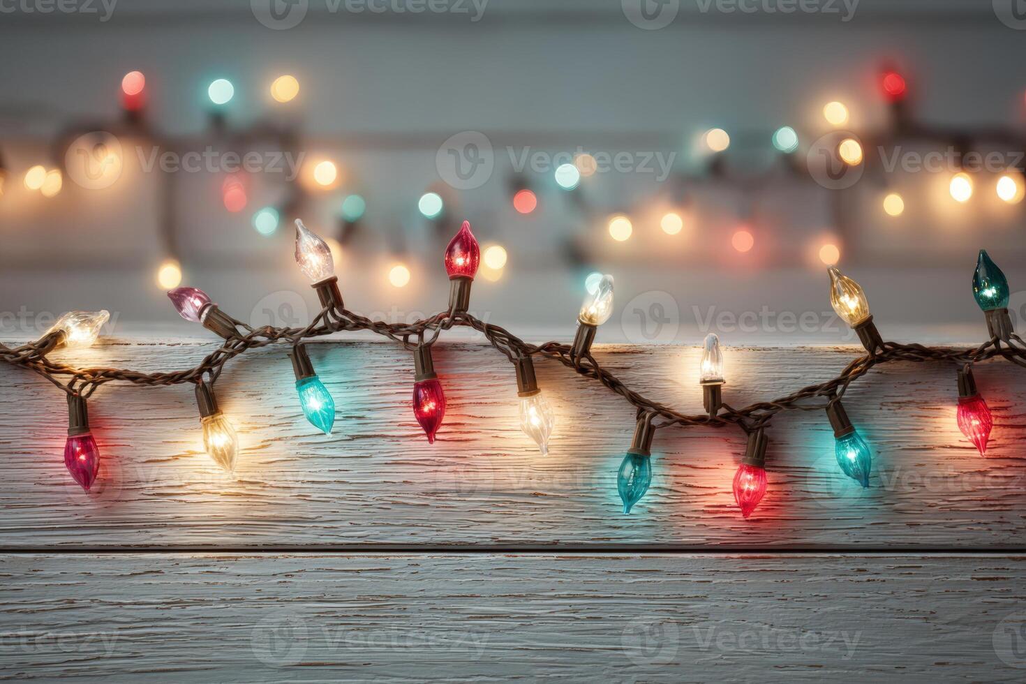 Colorful string lights with red, blue, and clear bulbs are beautifully arranged on a rustic wooden surface, creating a warm and festive atmosphere for celebrations and gatherings photo