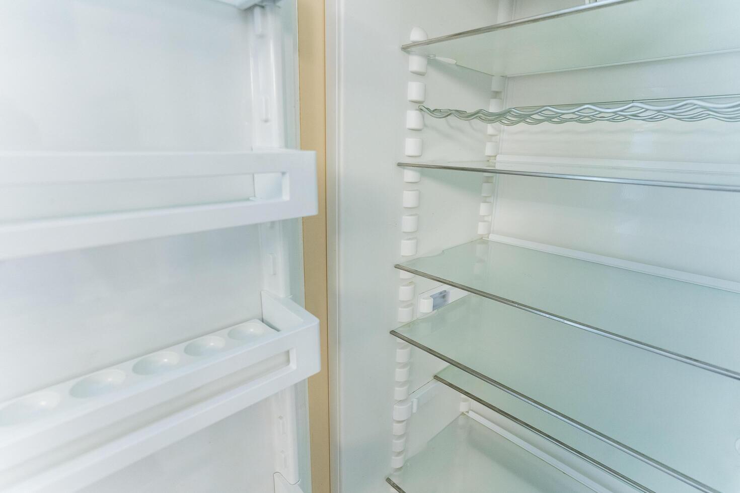 highresolution image showcasing refrigerator glass shelf with support rails and sleek modern design photo