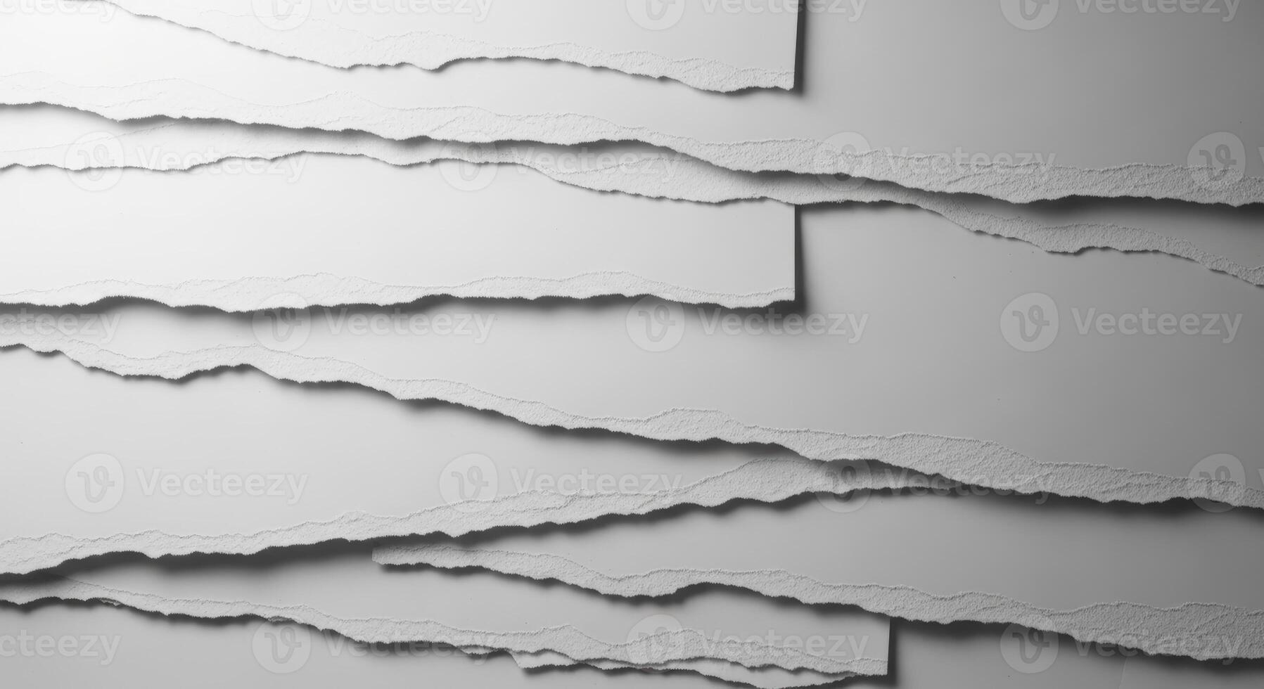 Textured background of layered white paper with torn edges, creating an abstract minimalist composition with soft shadows photo