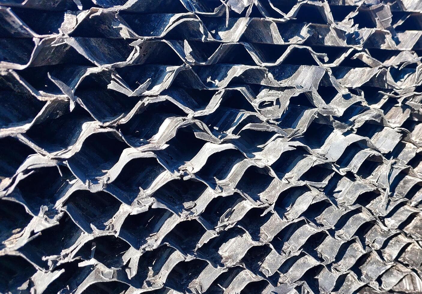 Offset corrugated fills designed for efficient cooling tower performance in industrial settings photo