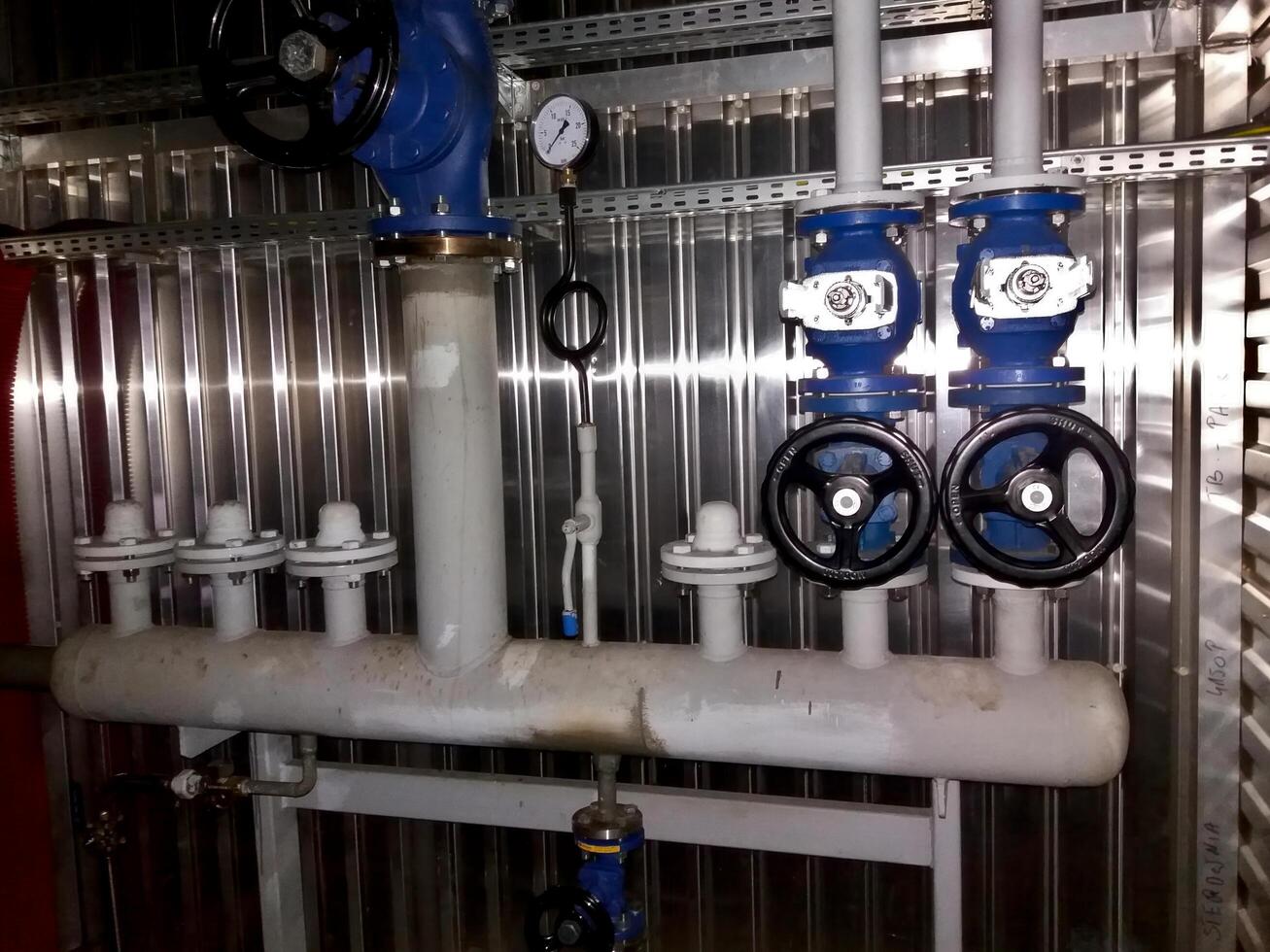 Steam Manifold With Multiple Valves in an Industrial Setting for Efficient Fluid Control photo