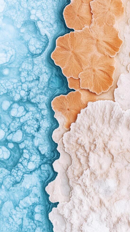 Abstract blue liquid with beige and white textured surface. Top view of mineral formations. Natural patterns and design backgrounds. photo
